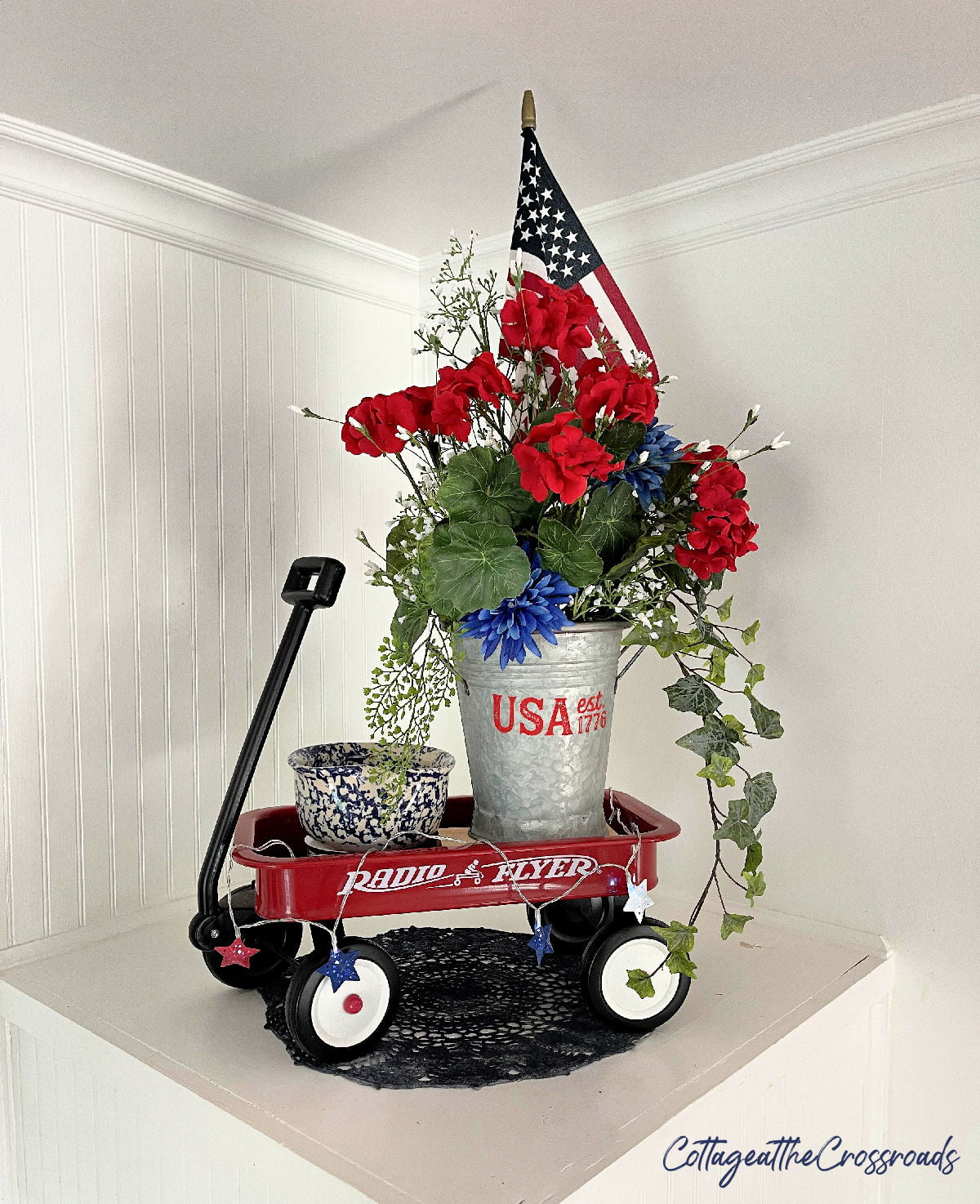 Patriotic decor in a little red wagon