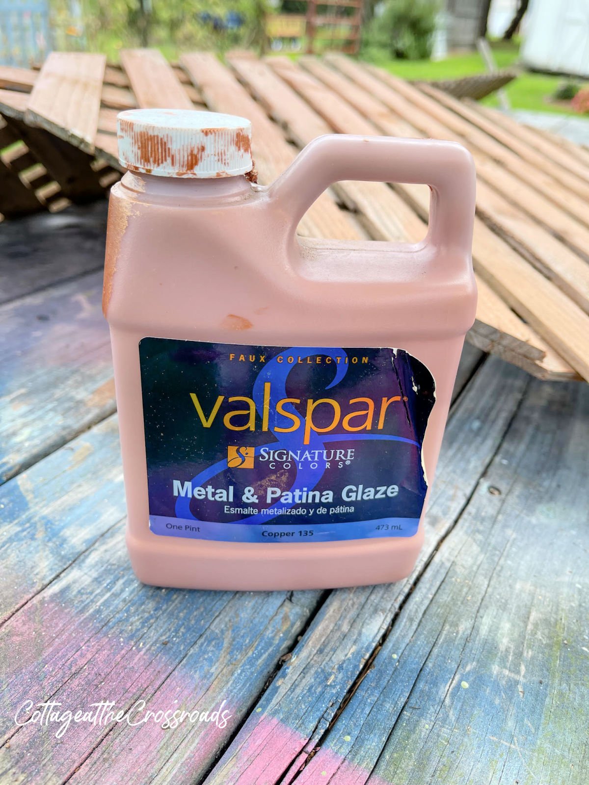 Container of valspar copper metal glaze