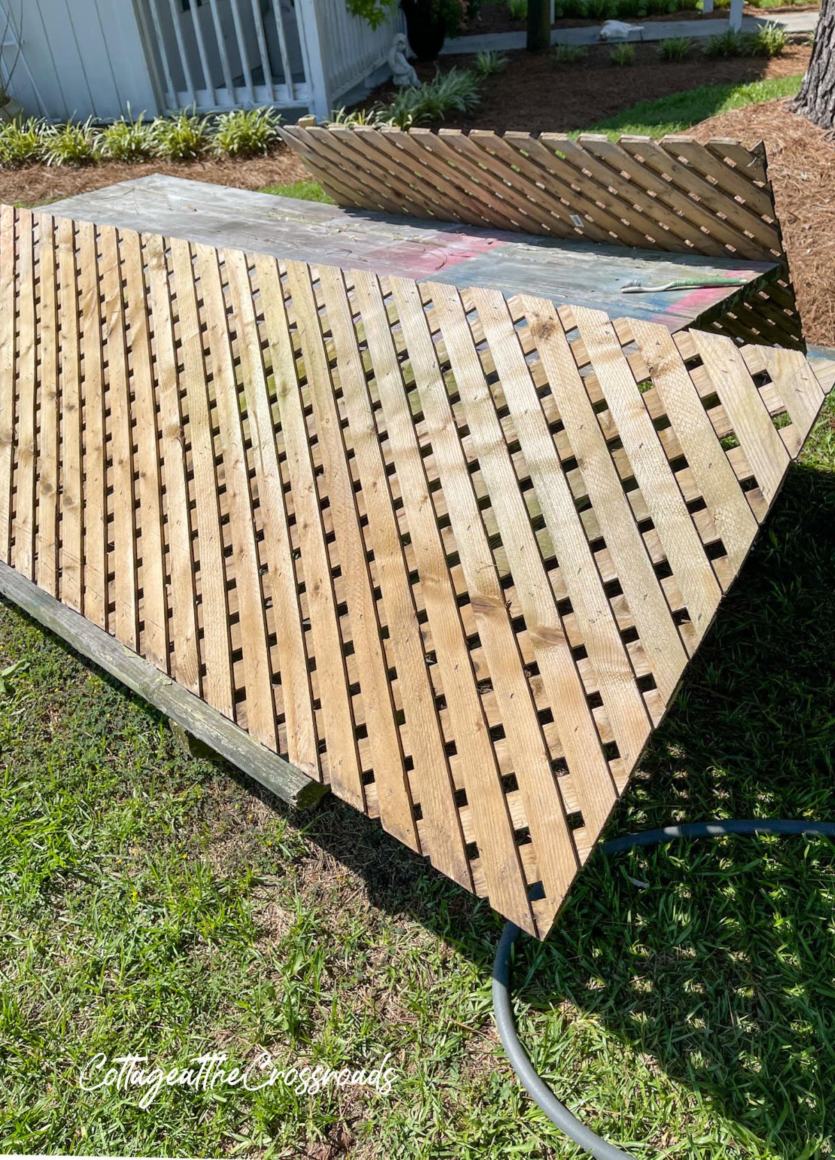 Wood lattice panels propped on a picnic table