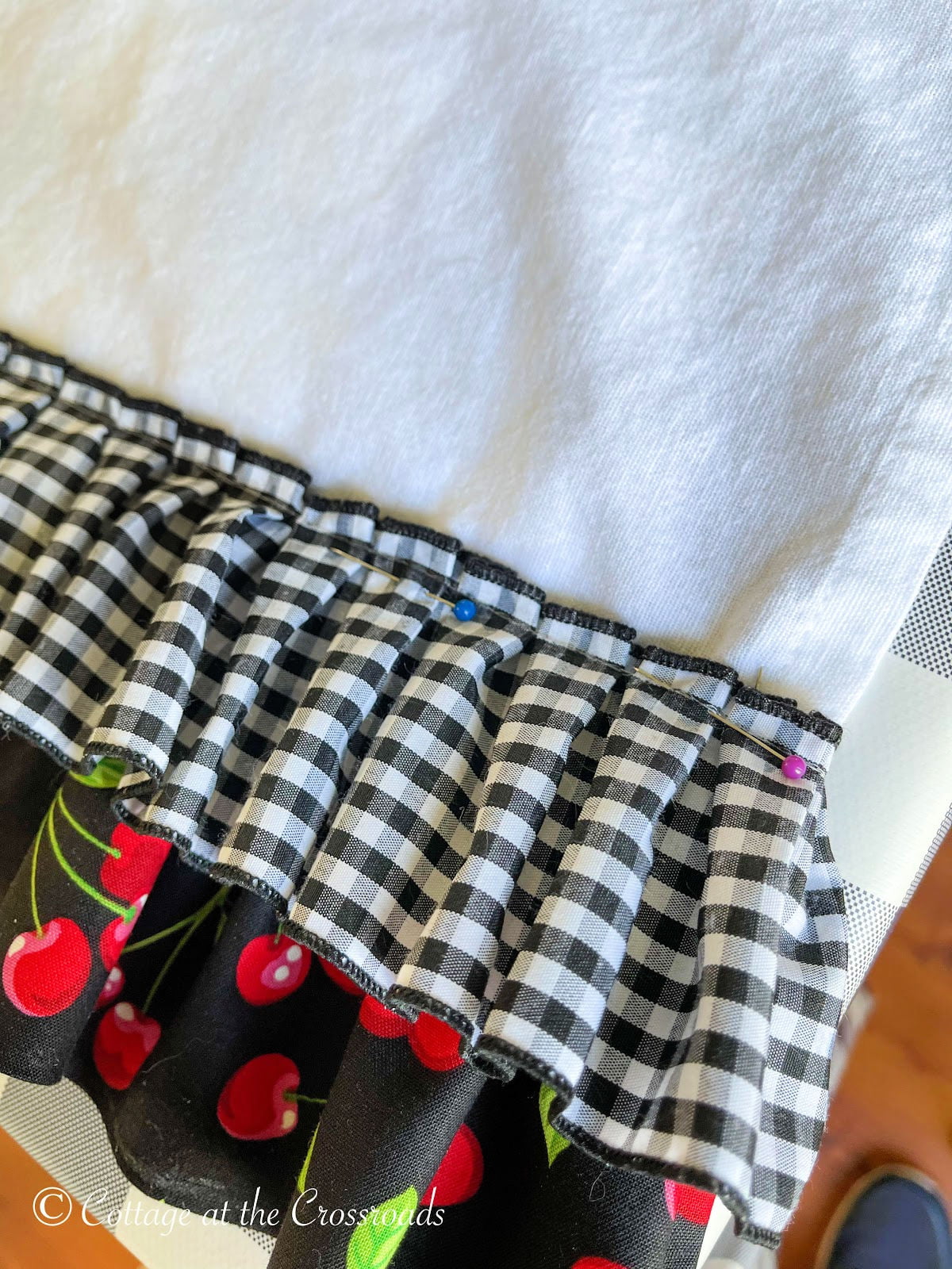 Pinned pleated black and white gingham trim