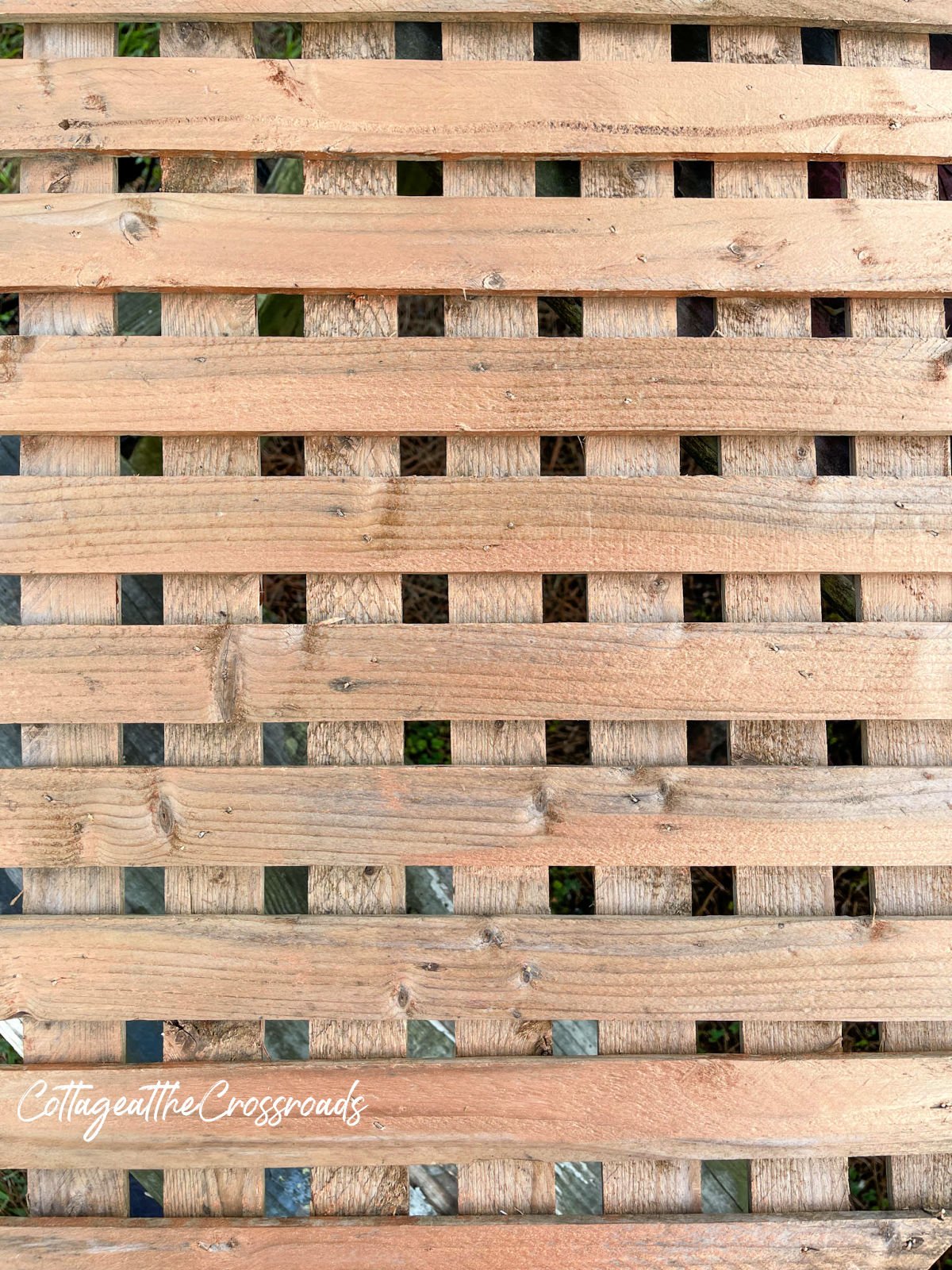 Wood lattice panel painted with copper spray paint and copper glaze