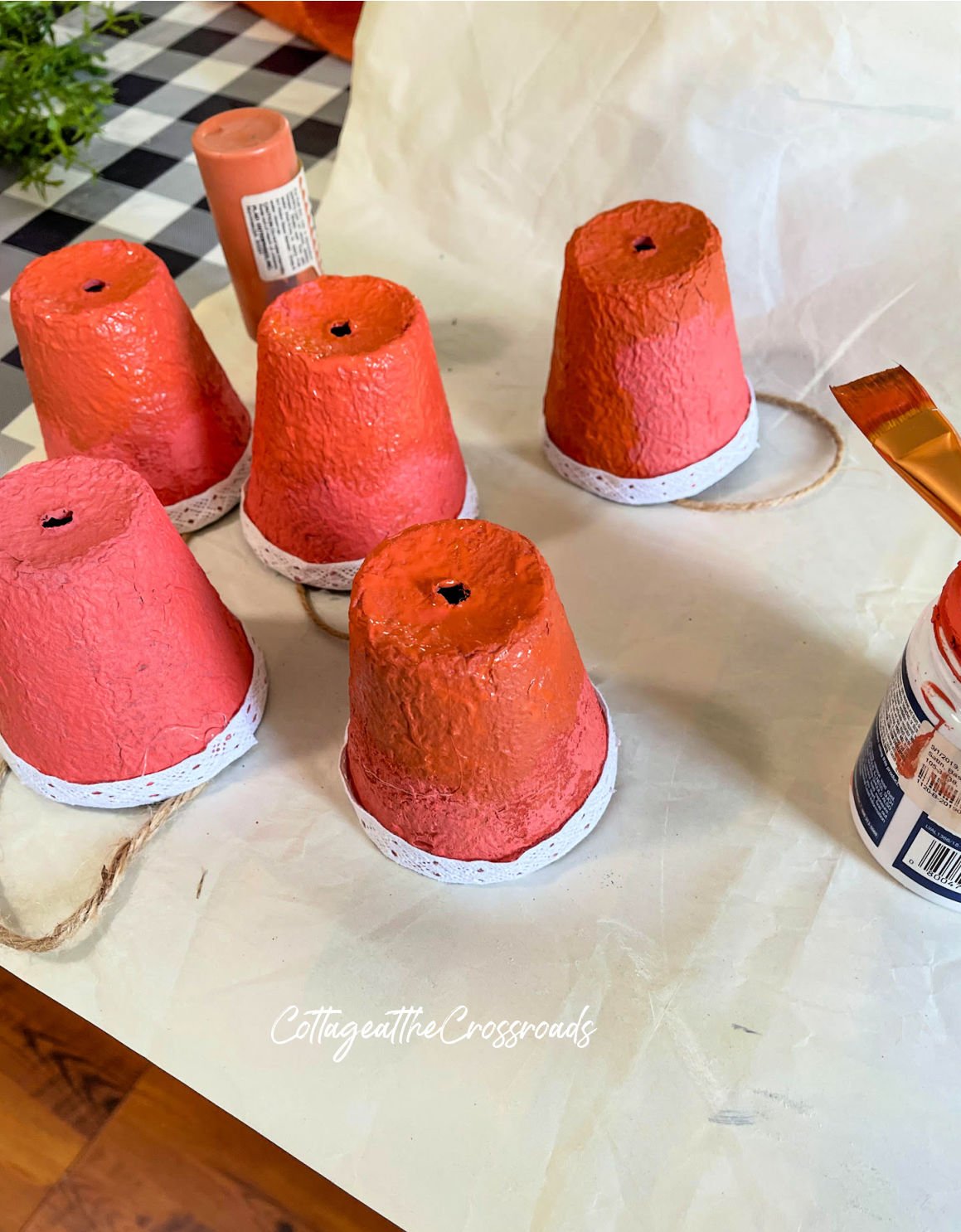 Peat pots painted orange