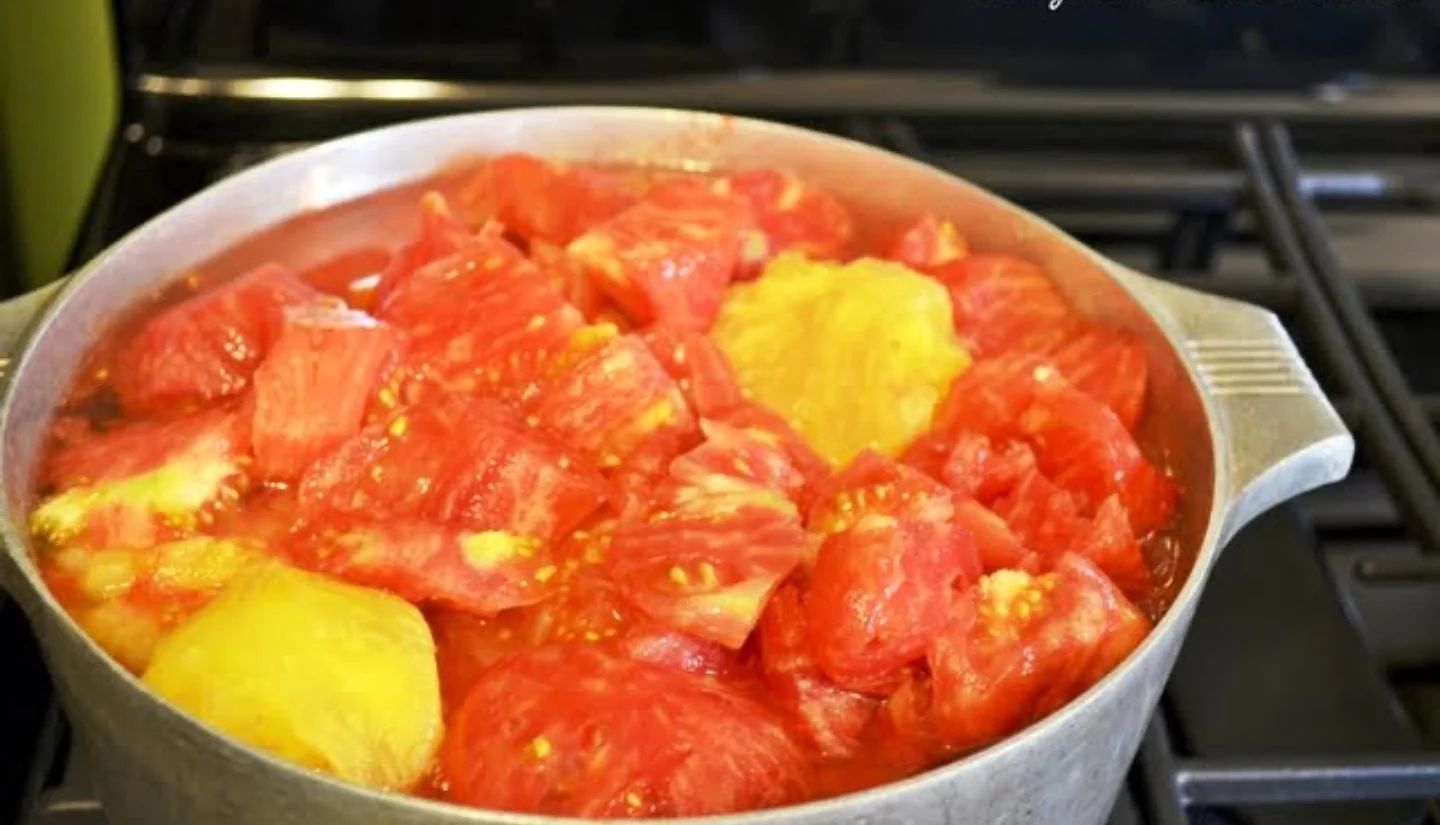 Sink full of split-skinned tomatoes