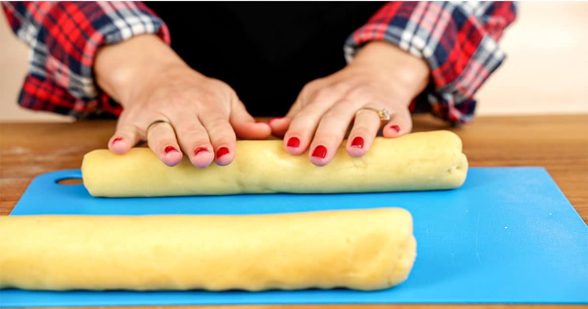 Dough being shaped to make finnish ribbon cookies