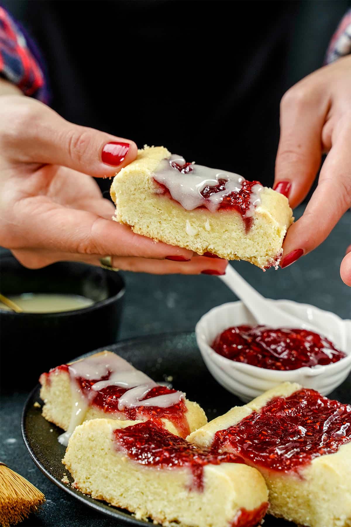 Hand holding finnish ribbon cookies