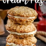 Stack of oatmeal sandwich cookies with text which reads oatmeal cream pies