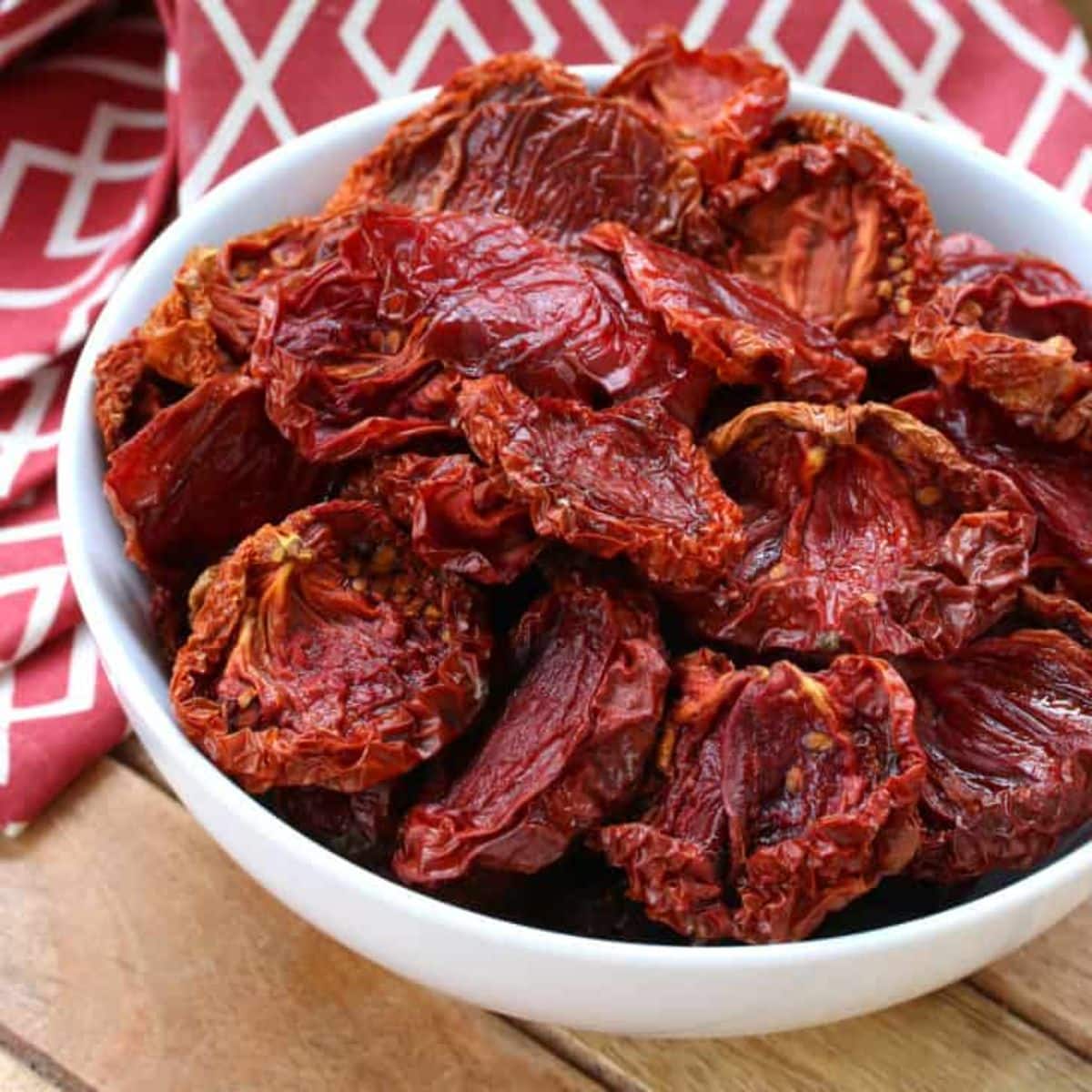 Sun-dried tomatoes in a white bowl.