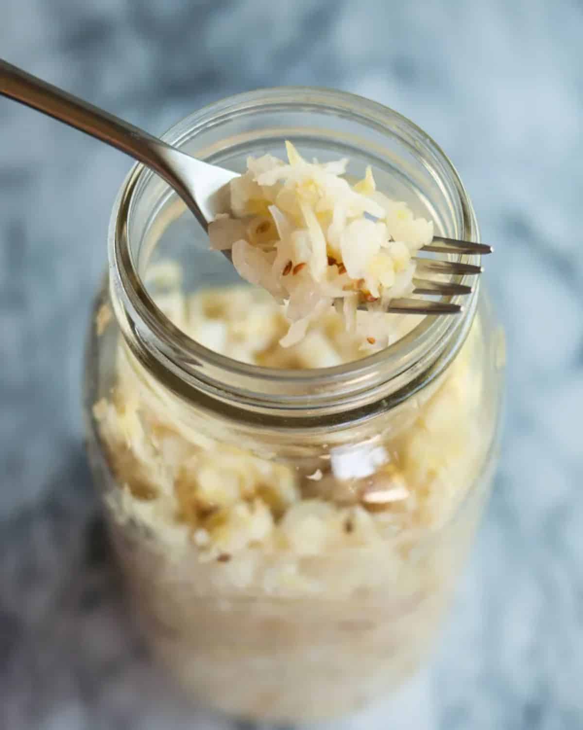 Homemade sauerkraut in a glass jar