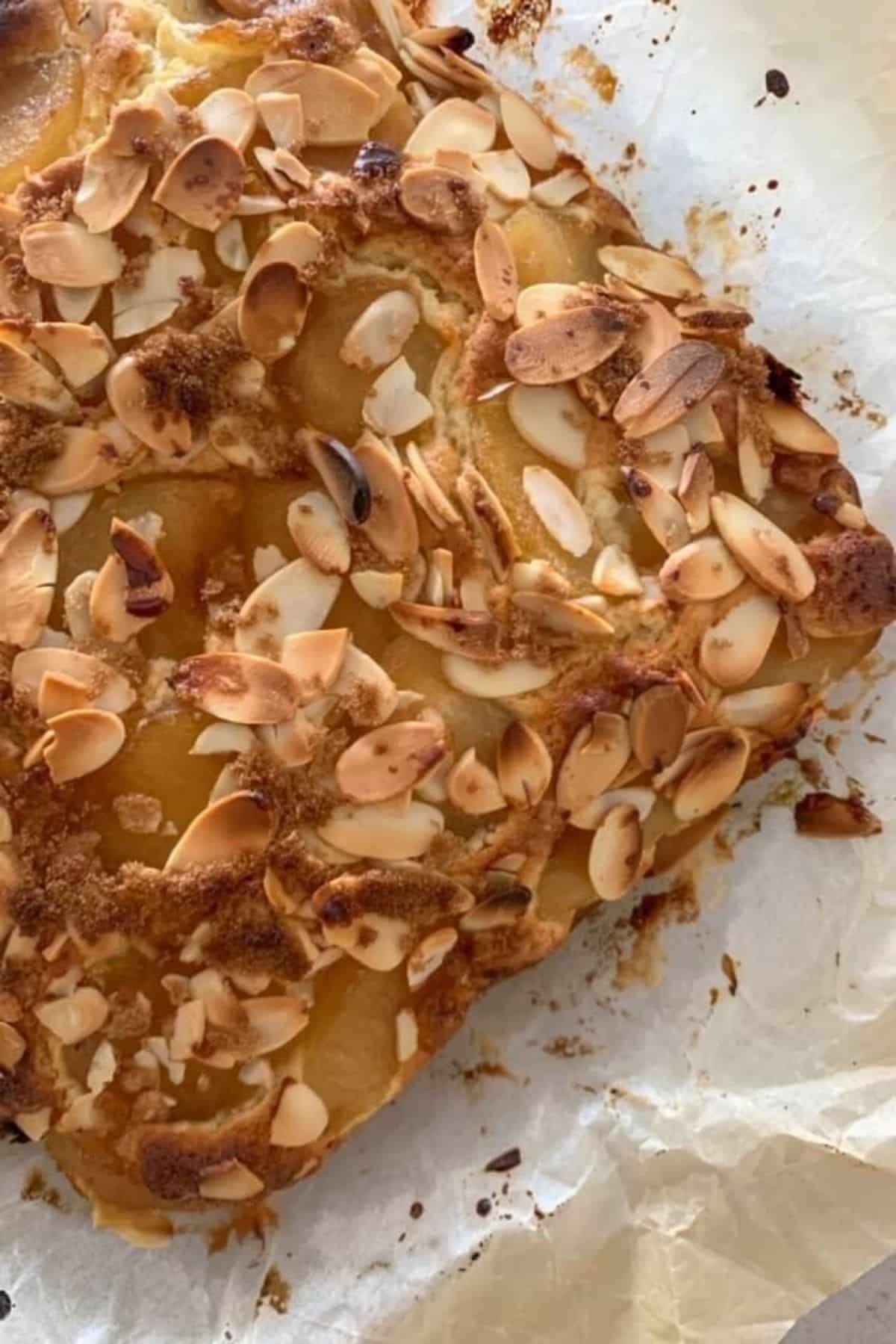 Sourdough apple cake on parchment paper.