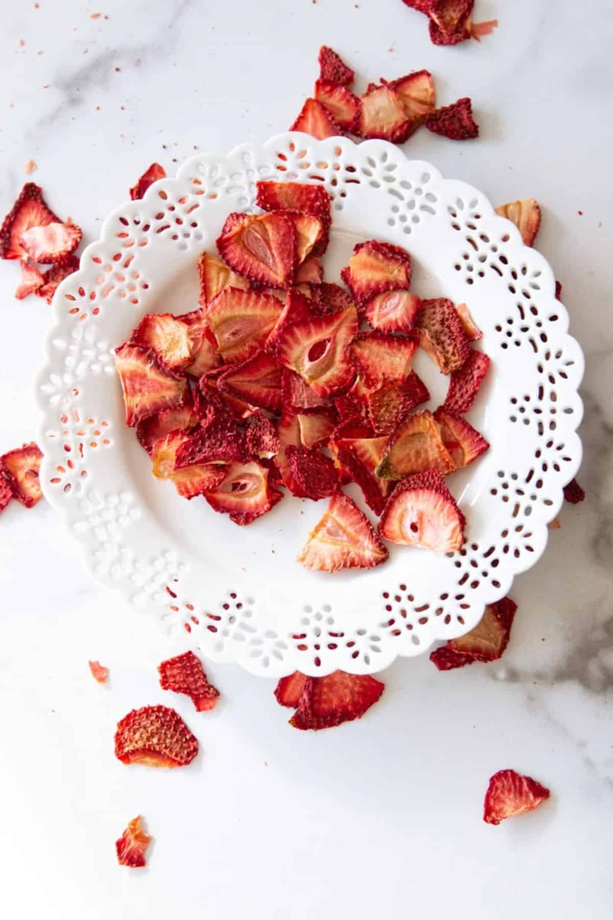 Dehydrated strawberries on a fancy plate.