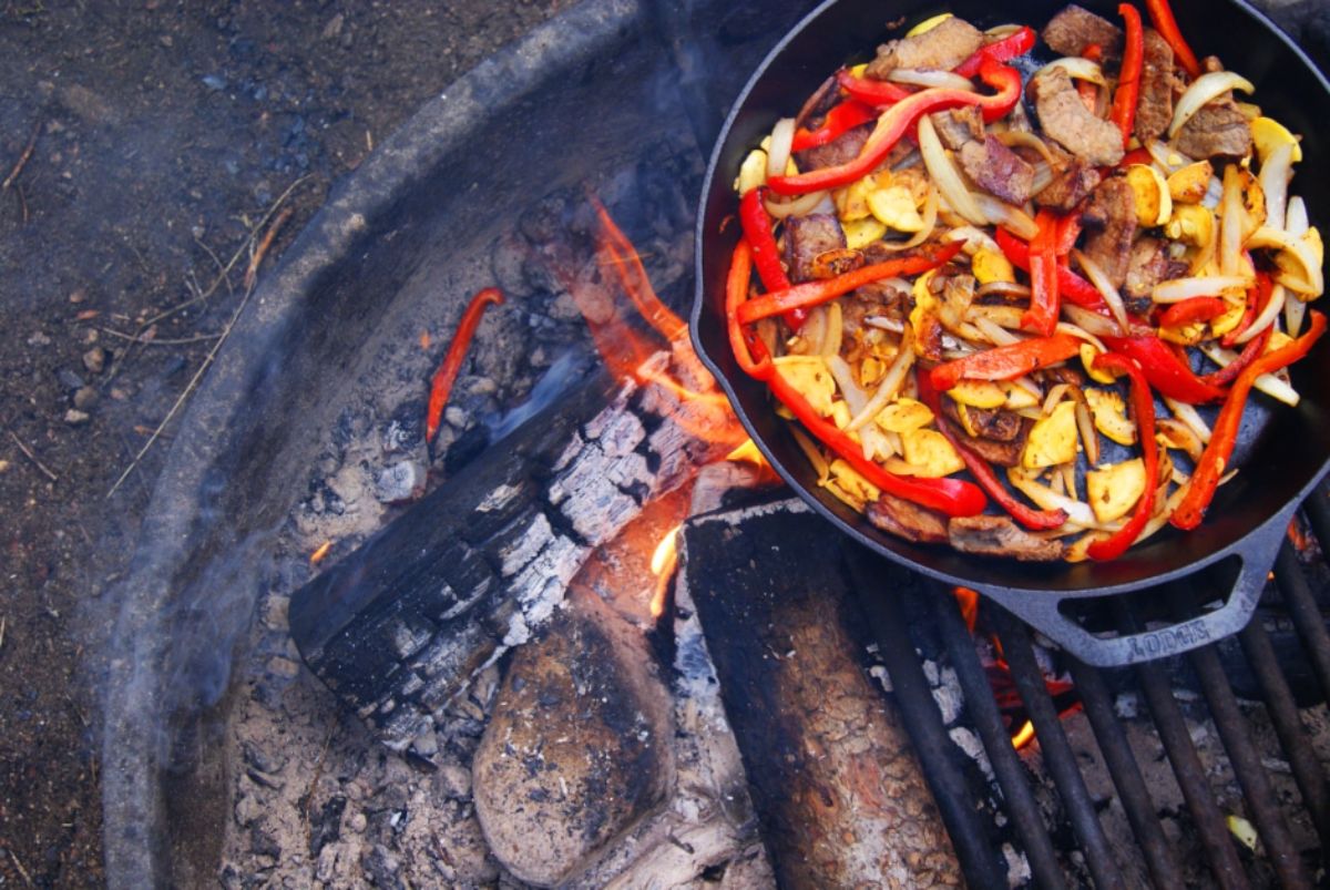 Camp fajitas in a black skillet.