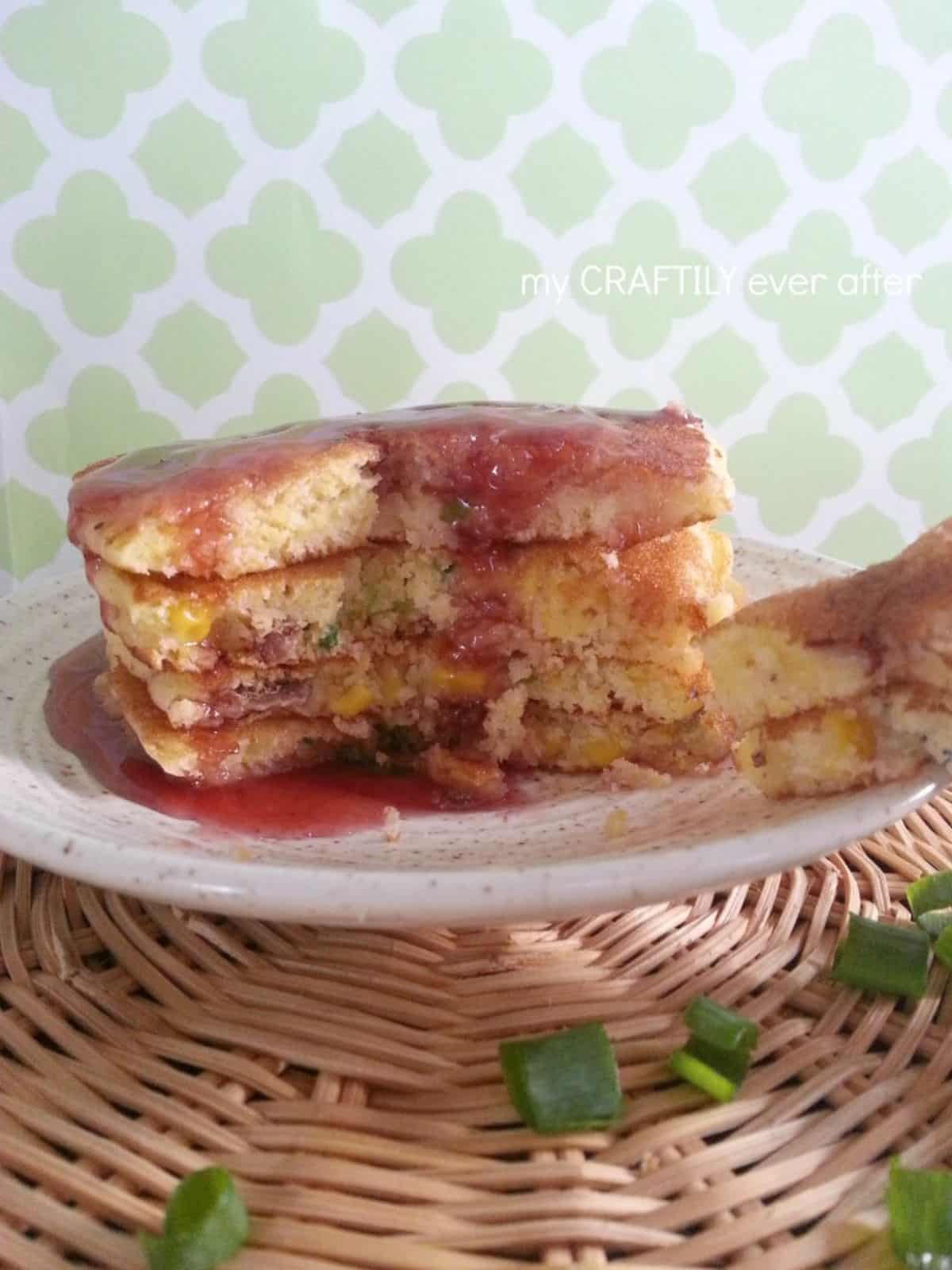 Bacon & sweet corn griddle cake on a cake tray.