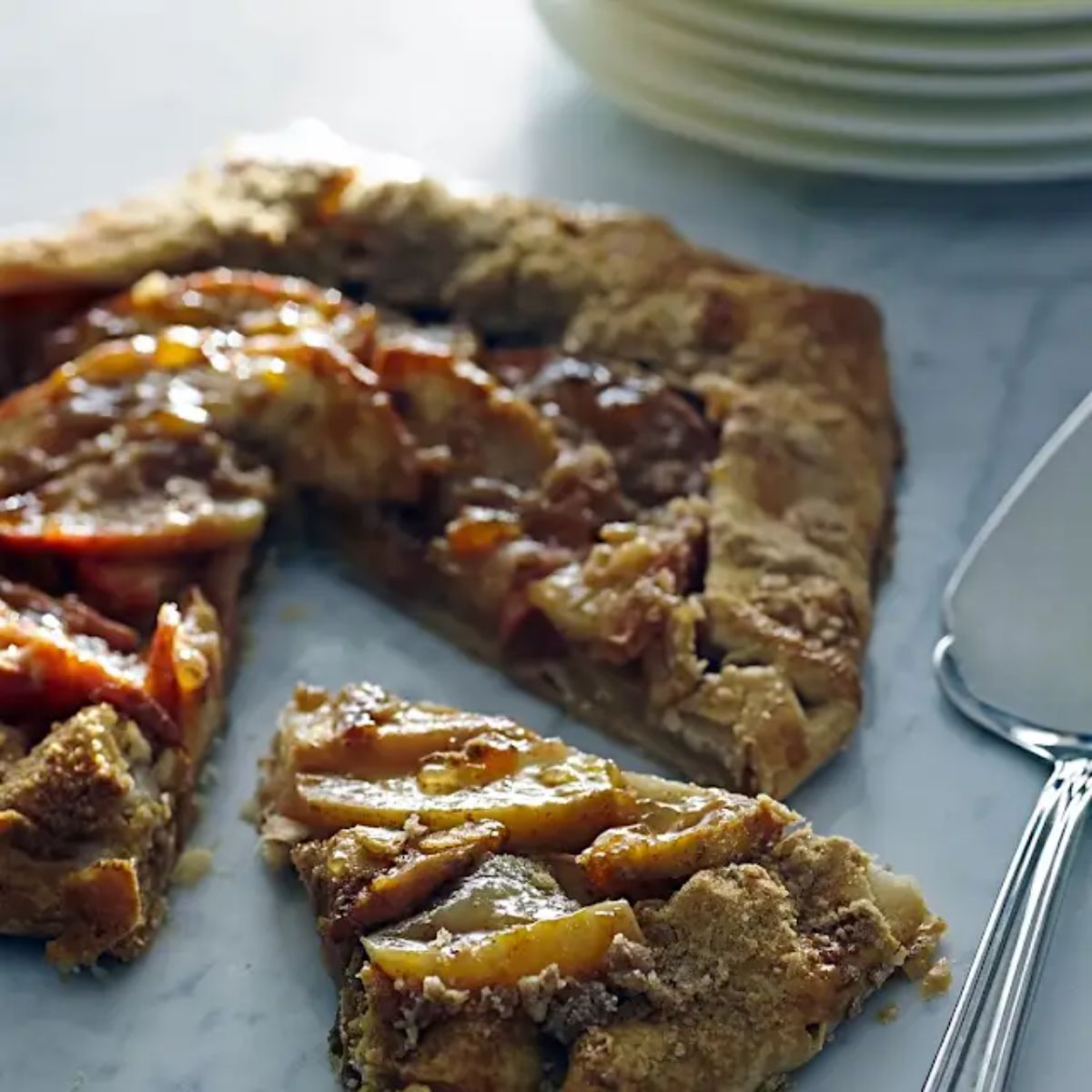 Cinnamon apple crostata on a table.