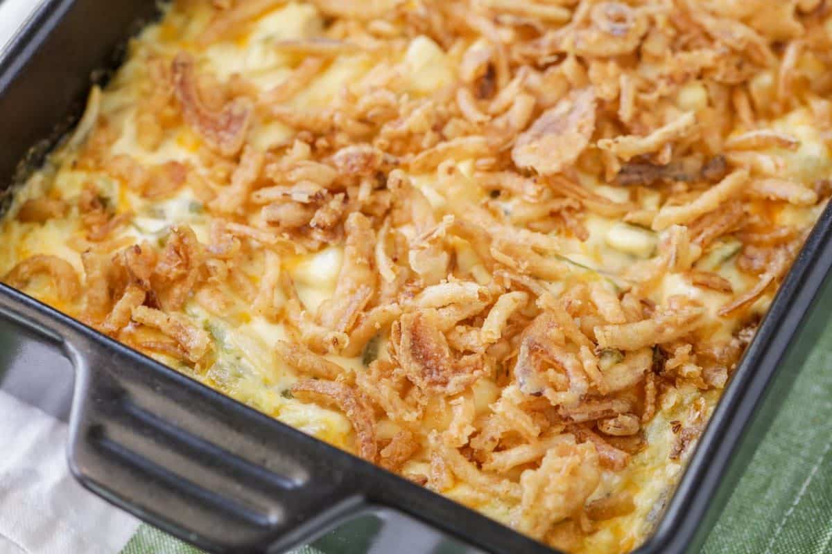 Delicious french onion chicken in a black casserole.