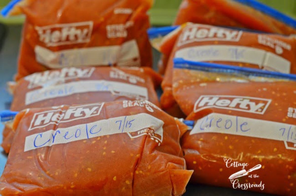 Homemade creole sauce in plastic packages.