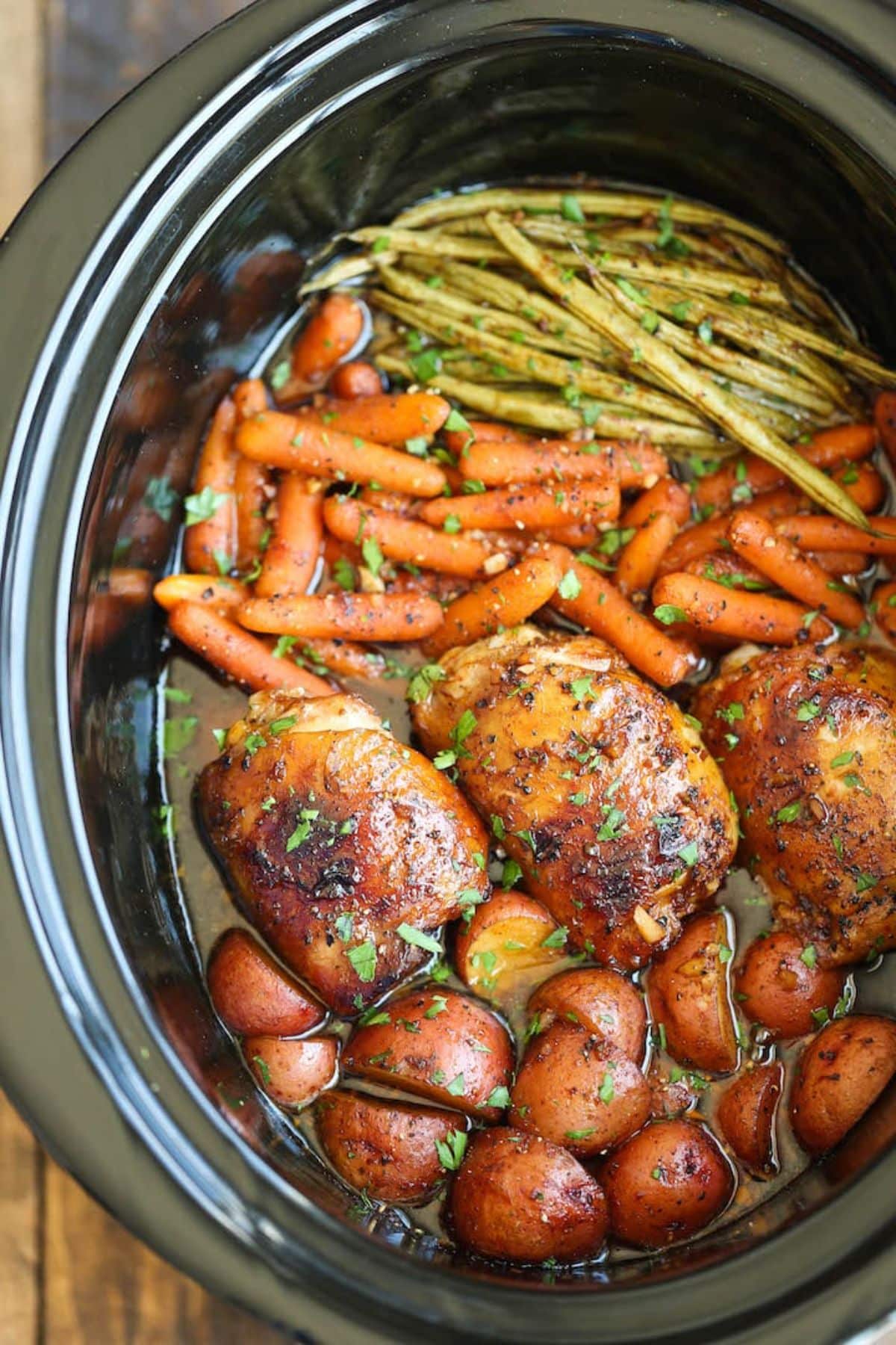 Deliicous and healthy slow cooker honey garlic chicken and veggies.