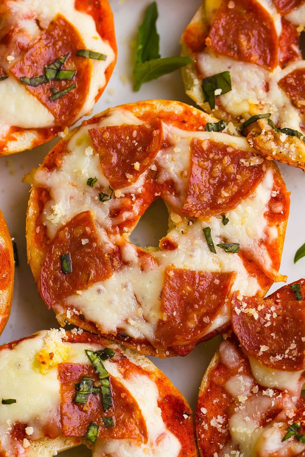 Delicious bagel bites on a white tray.