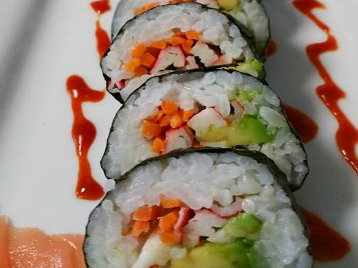 Crispy california roll on a white tray.