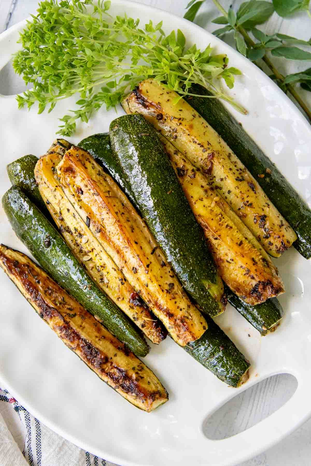 20 minute roasted zucchini on a white plate.