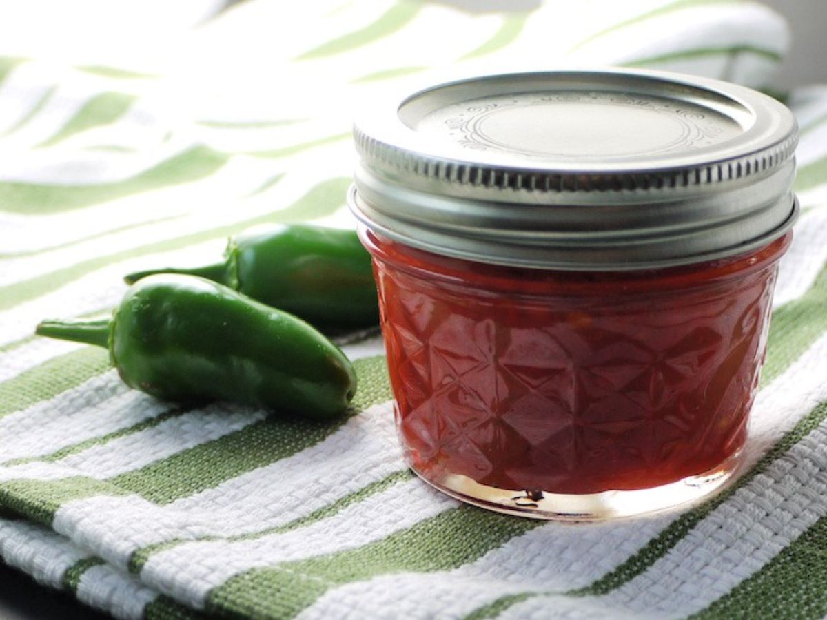 Hot pepper sauce in a glass jar.