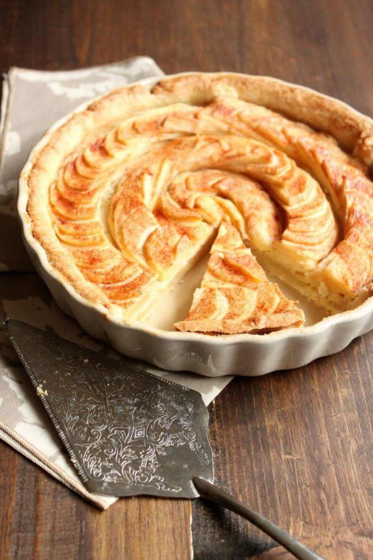 Apple tart with almond paste filling in a casserole.