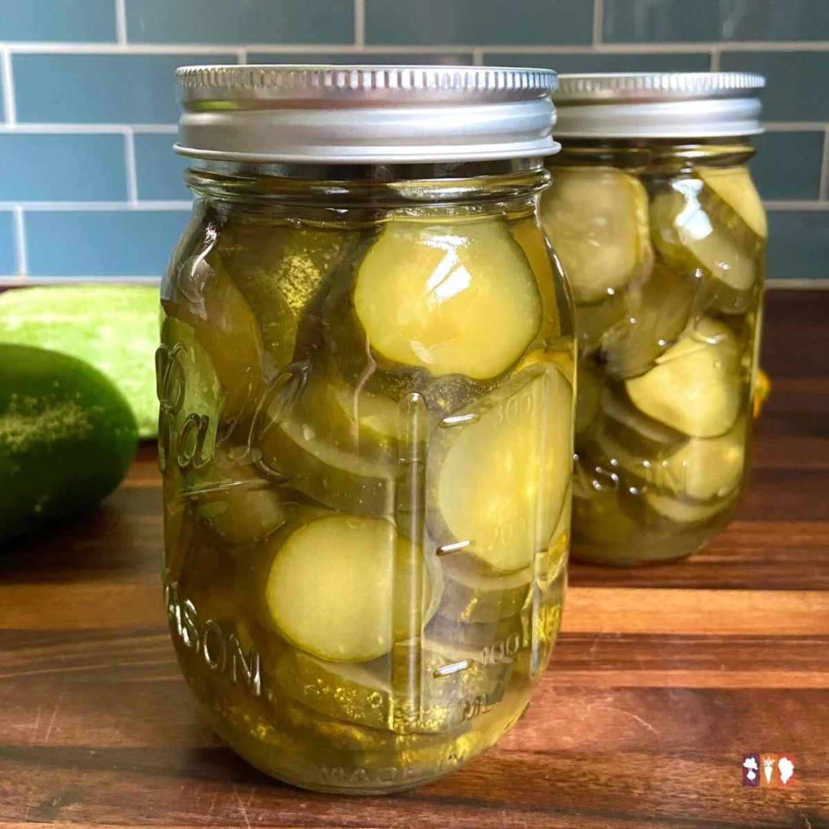 Crunchy lime pickles in two glass jars.