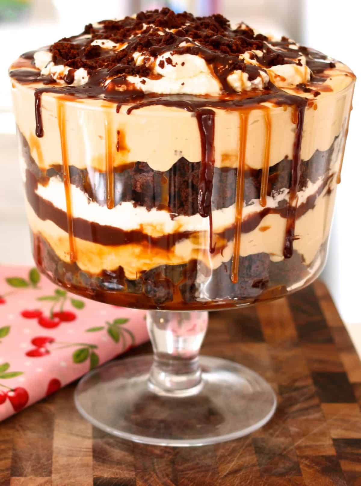 Scrumptious salted caramel brownie trifle in a glass cup.