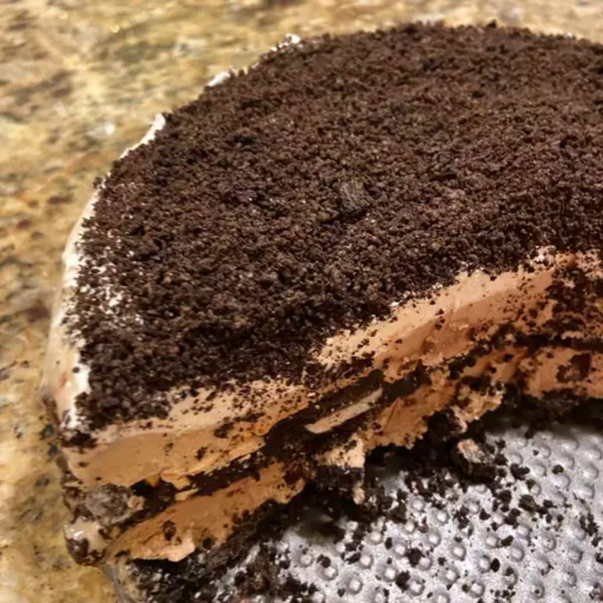 Delicious mud pie on a cake tray.