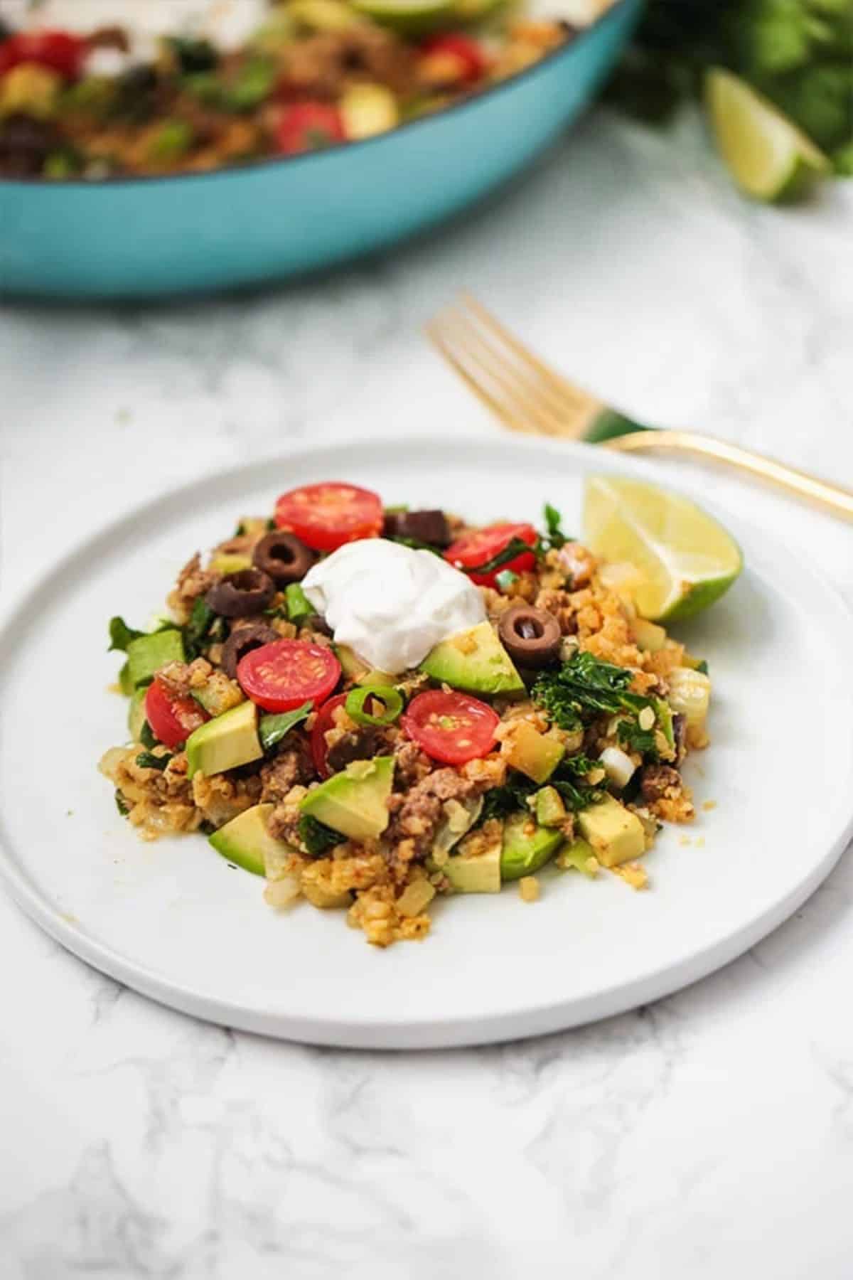 Healthy and delicious one pan taco on a white plate.