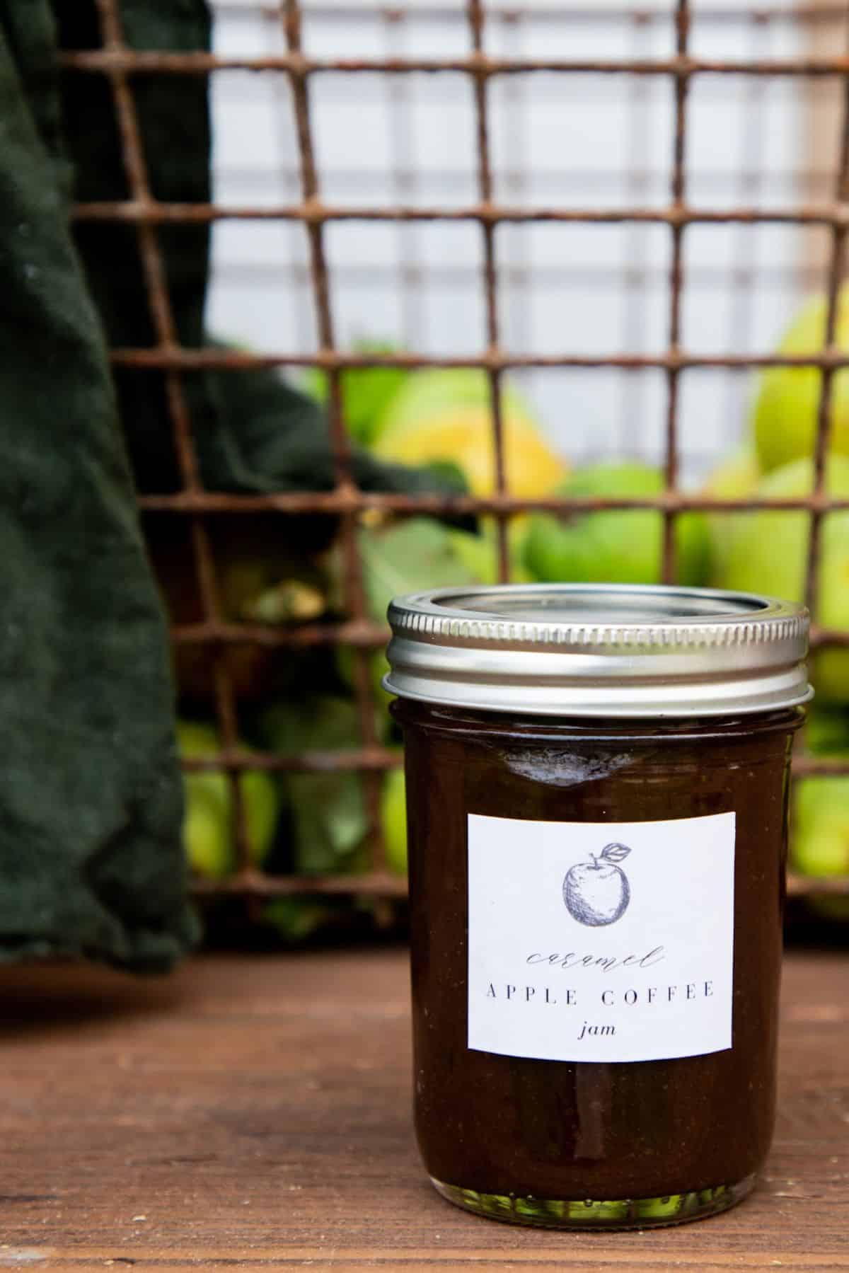 Delicious caramel apple coffee jam canned in a glass jar.