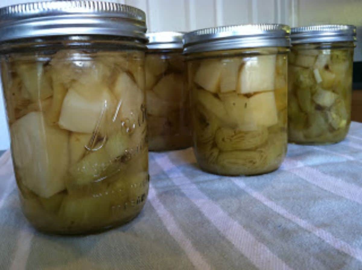 Canned potato leek soup in glass jars.