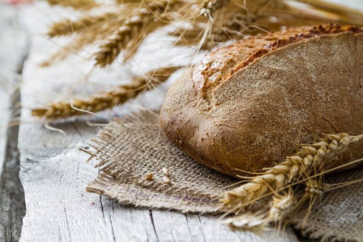 Loaf of depression bread on a wooden table.