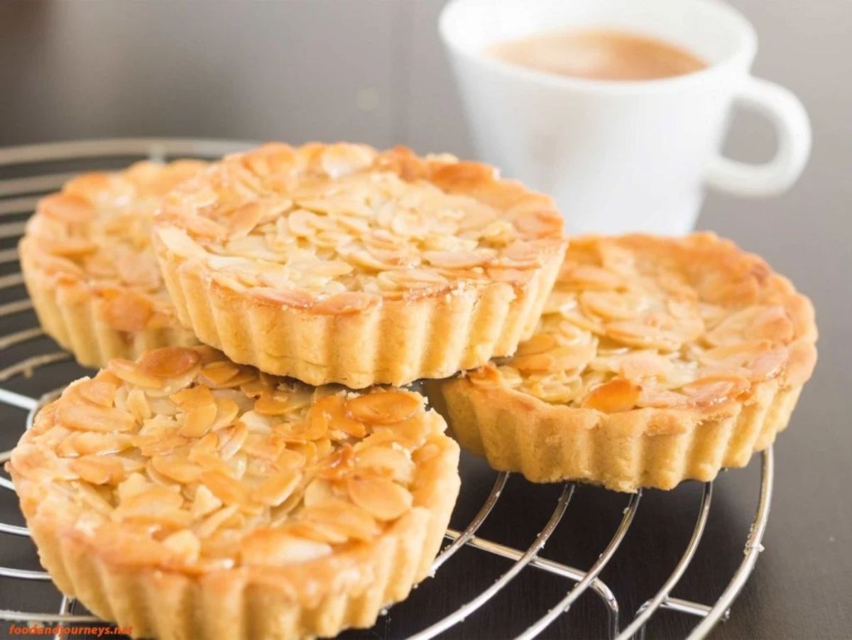 Swedish almond tarts on a resting grid.