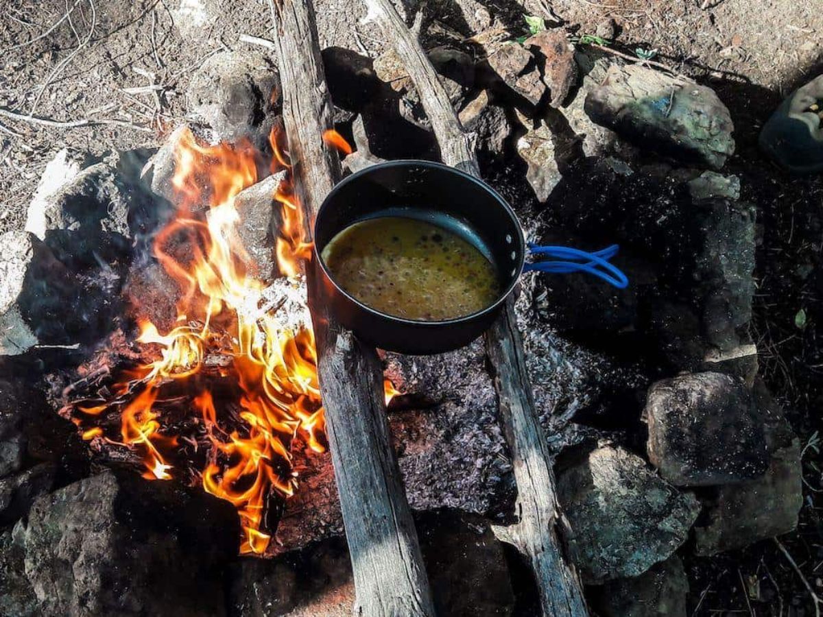 Camping breakfast in a black skillett.