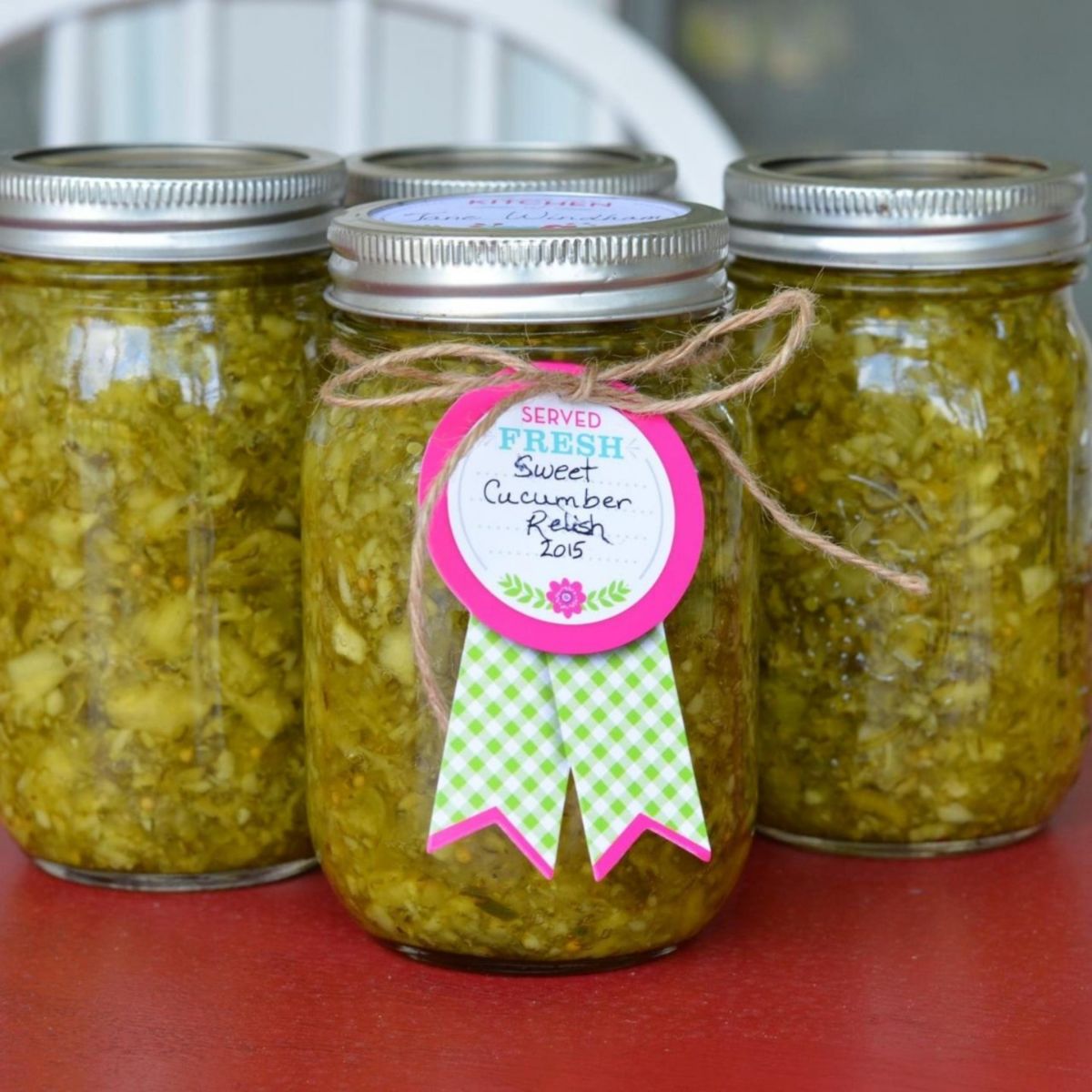 Sweet cucumber relish in glass jars.