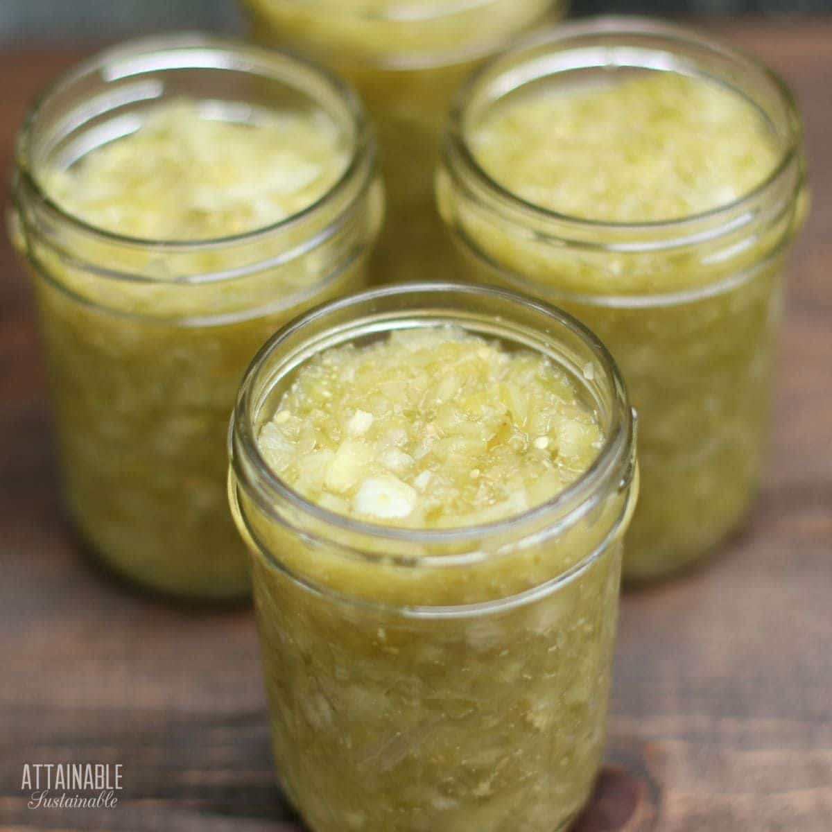 Chow chow green tomato relish canned in glass jars.