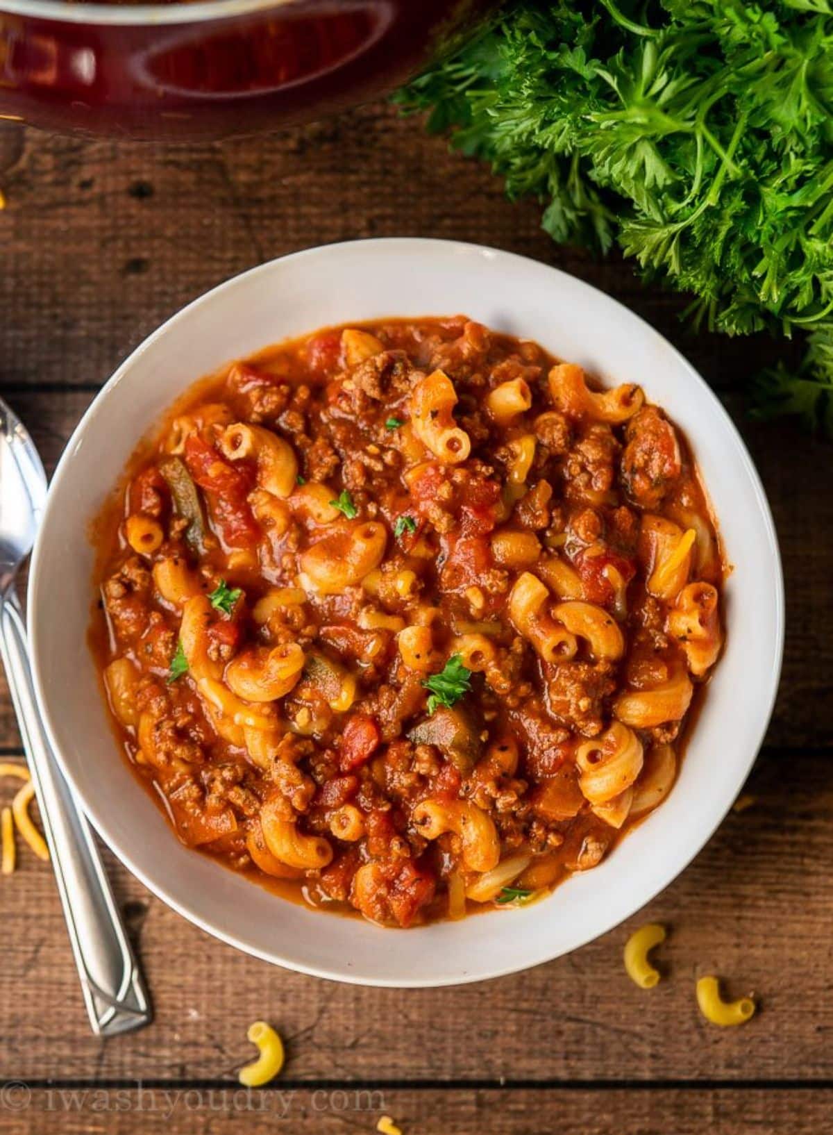 Delicious goulash in a white bowl.