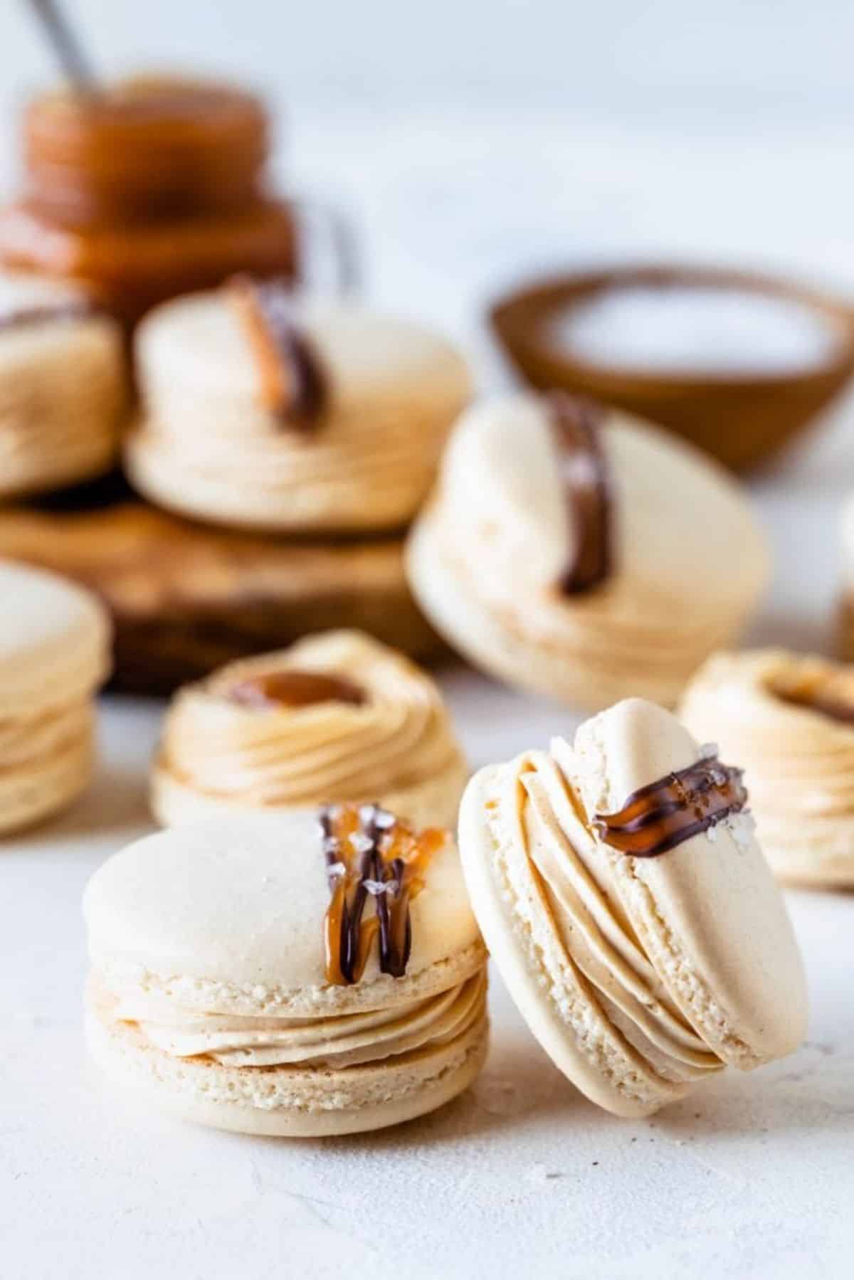 Delicious salted caramel macarons on a table.