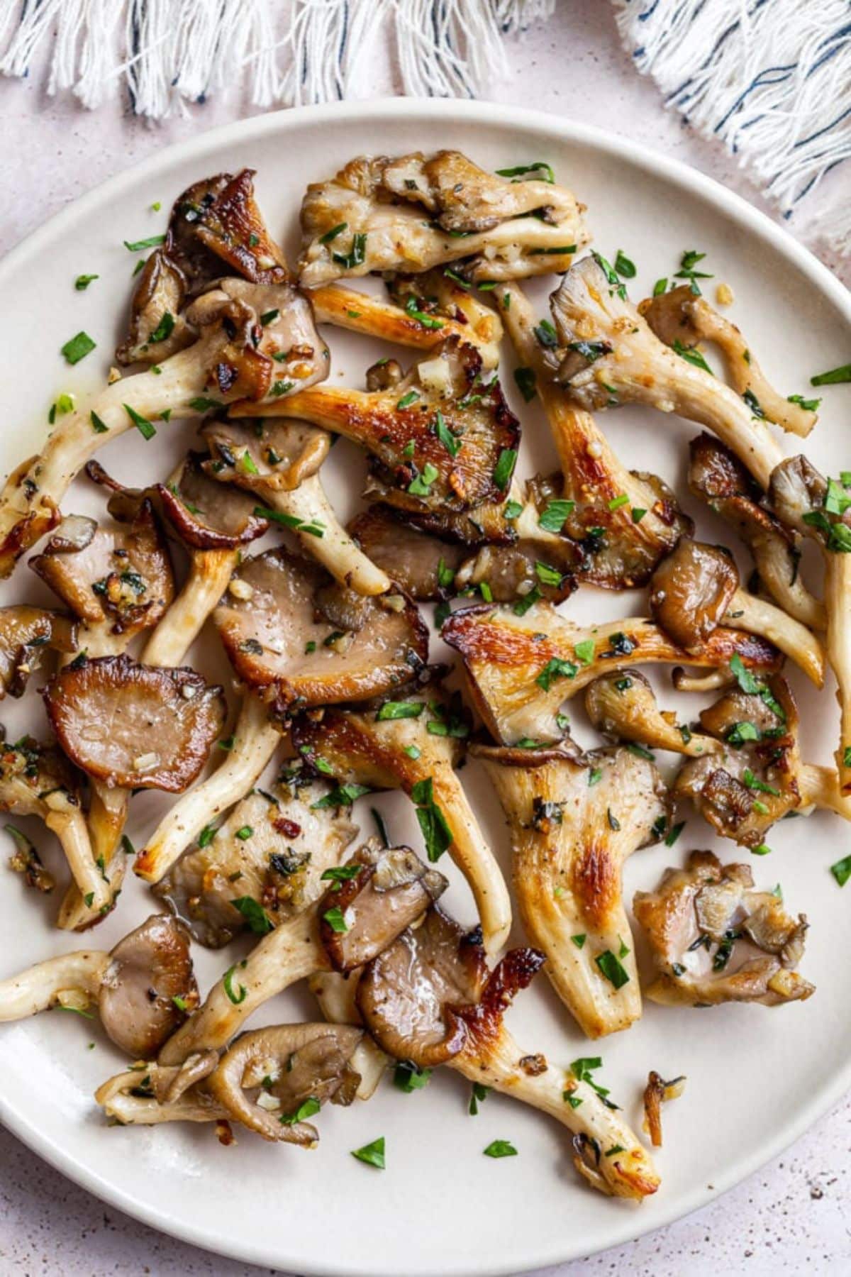 Oyster mushrooms on a white tray.