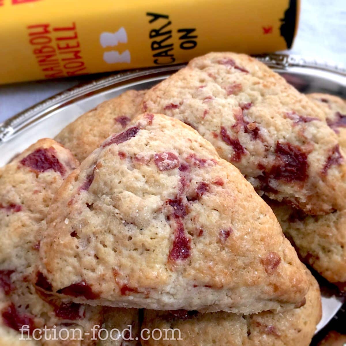 Delicious sour cherry scones on a metal tray.