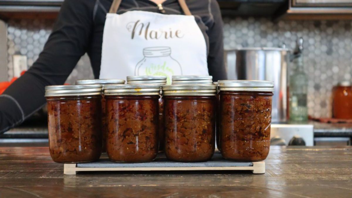 Canned meat lovers chili in glass jars.