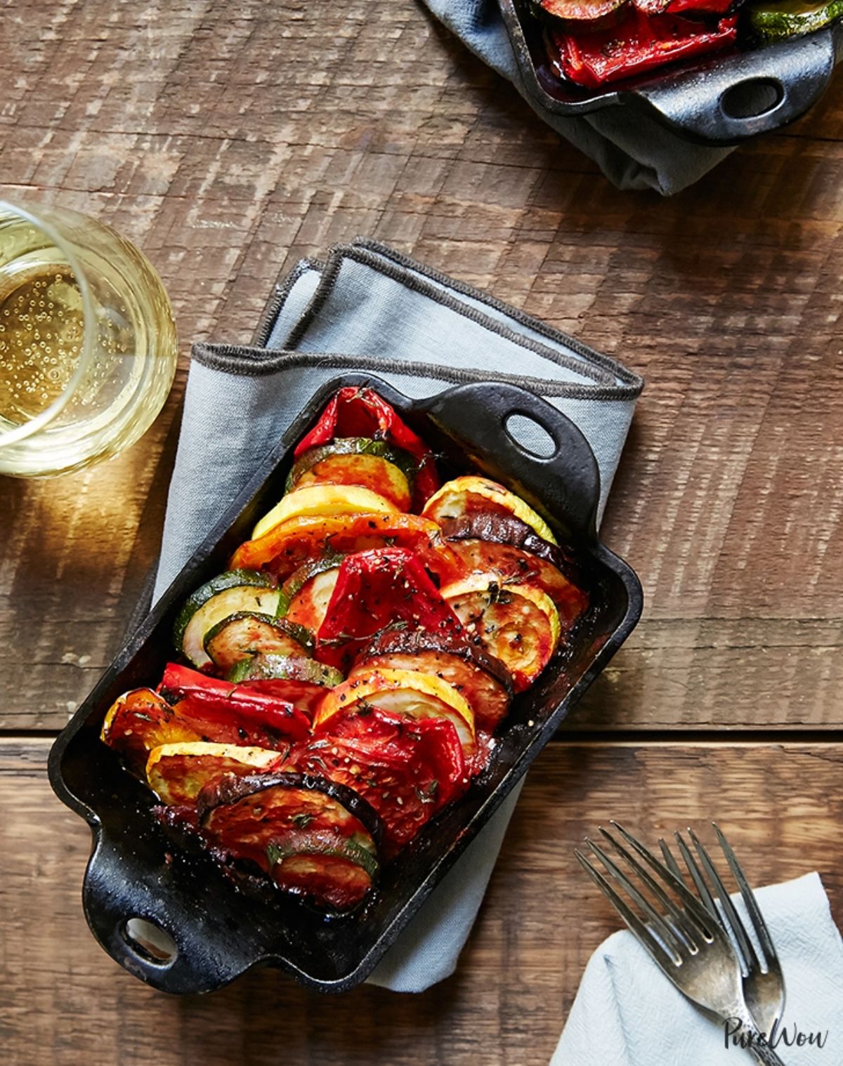 Easy one-pan ratatouille in a black casserole.