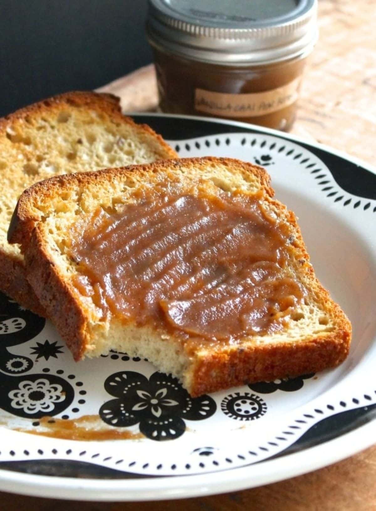 Vanilla chai pear butte on a slice of bread on a plate.