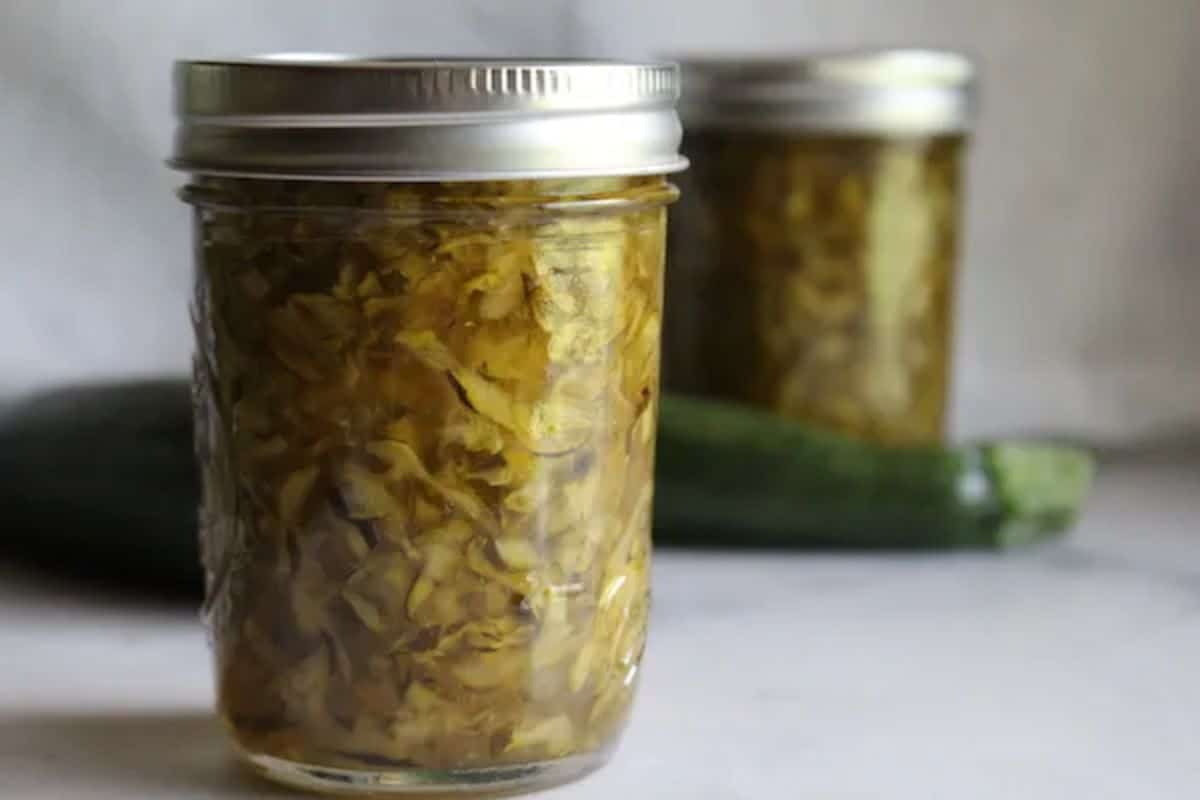 Zucchini marmalade in a glass jar.