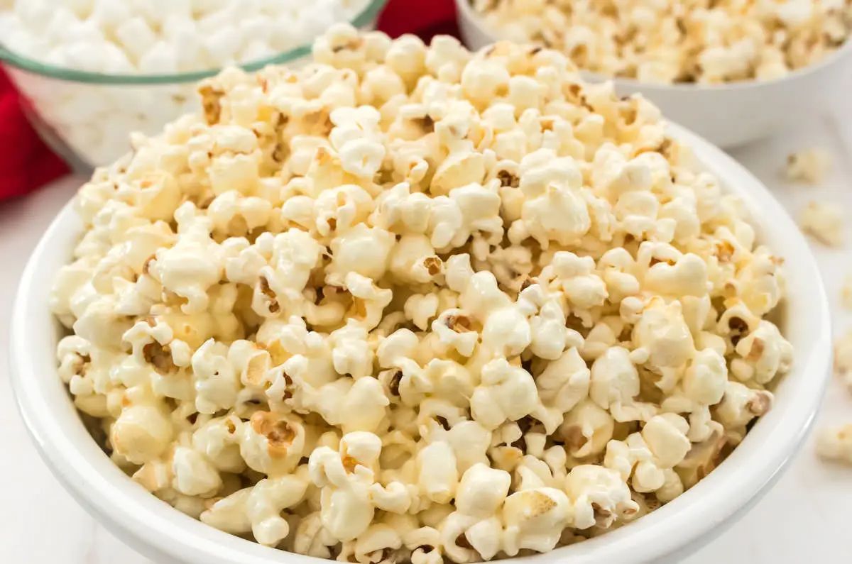 Delicious marshmallow popcorn in a white bowl.