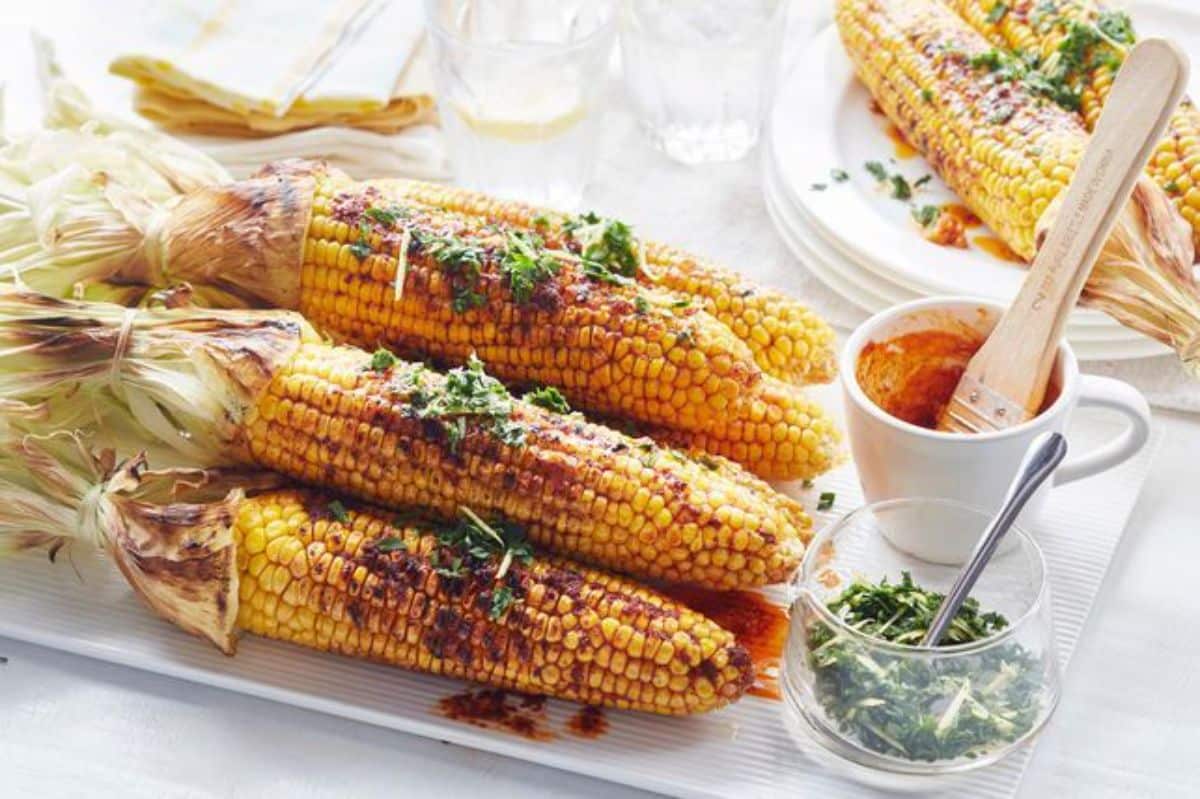 Smoked paprika barbecue corn on a white tray.