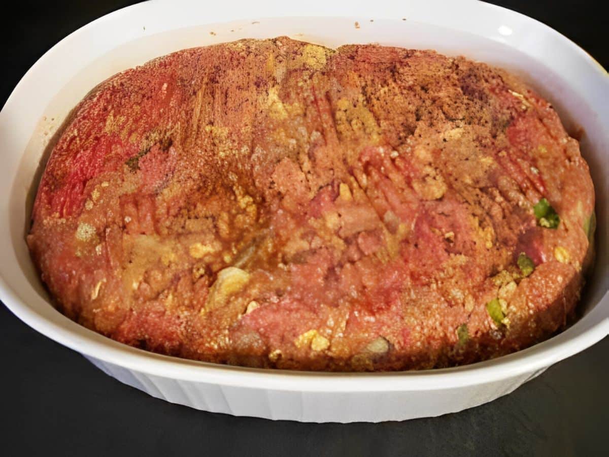 Delicious meatloaf in a white casserole.