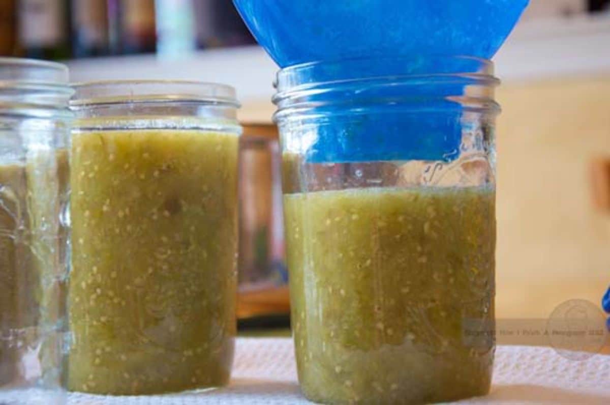 Salsa verde in glass jars.