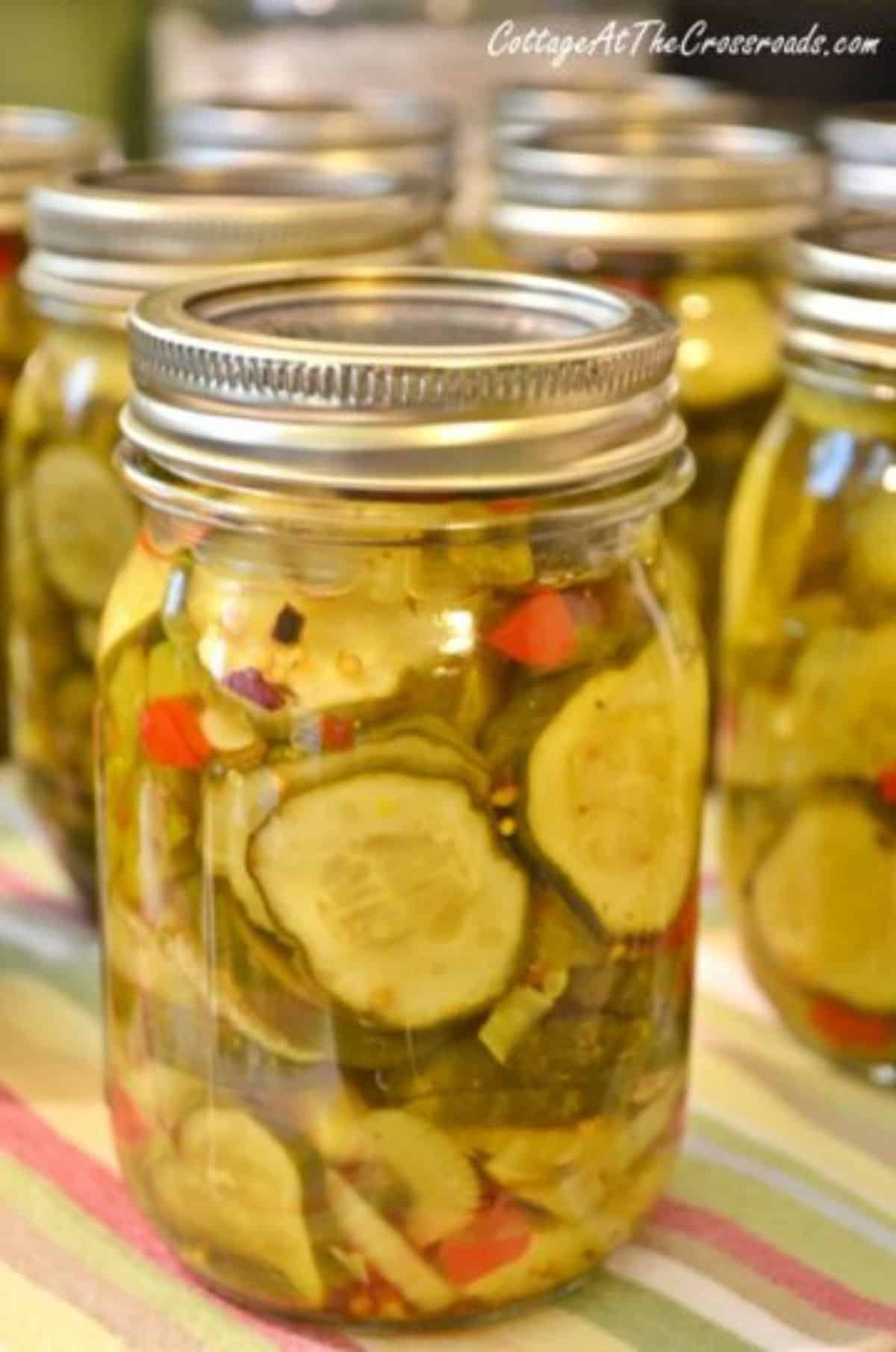 Zesty bread ‘n butter pickles in glass jars.