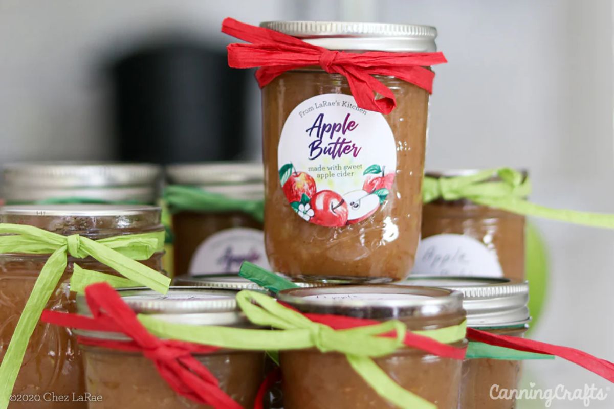 Apple cider butter canned in glass jars.